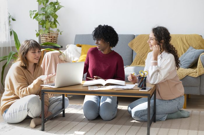 Small startup team working together in a casual office space
